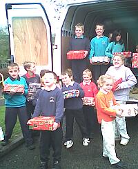 loading van with shoe boxes